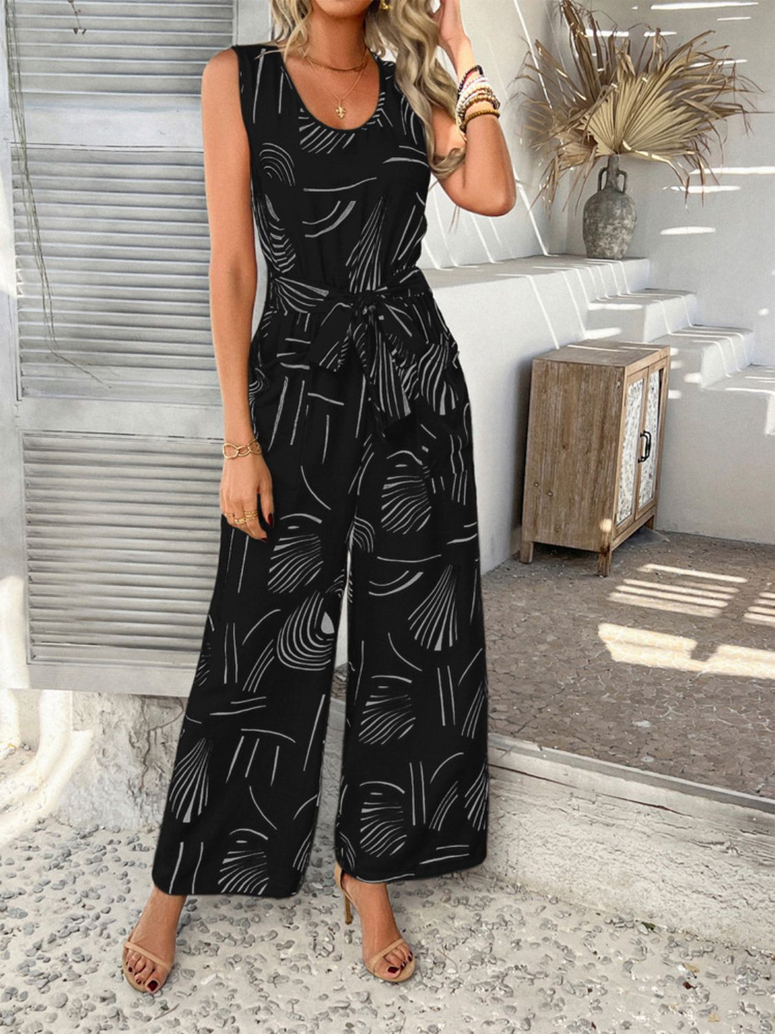 Devine Printed Round Neck Sleeveless Tie Waist Jumpsuit - Flip Flop Dynasty