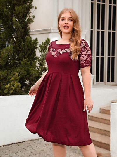 Plus Size Ruched Round Neck Short Sleeve Dress - Flip Flop Dynasty