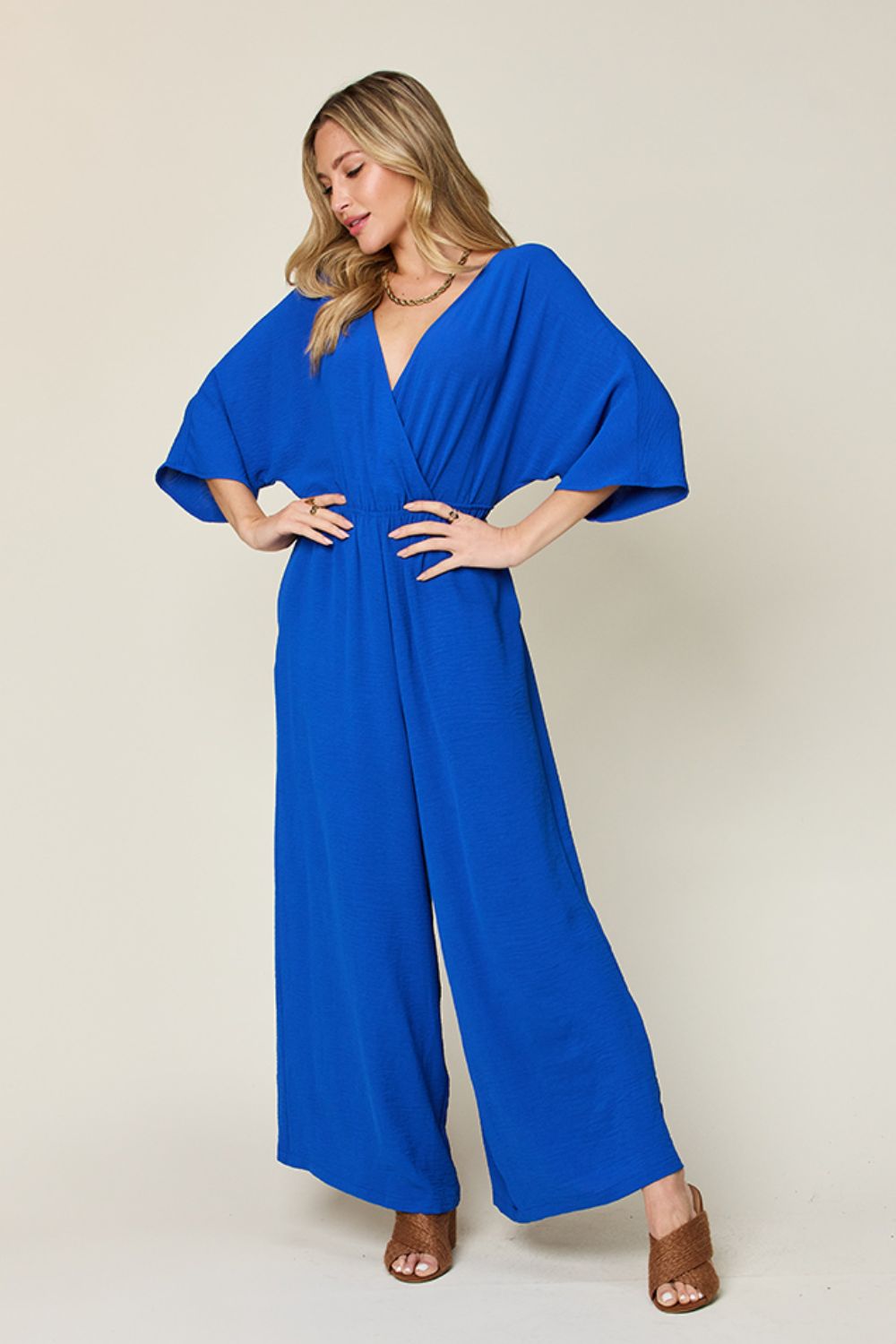 Double Take Full Size Surplice Wide Leg Jumpsuit with Pockets - Flip Flop Dynasty